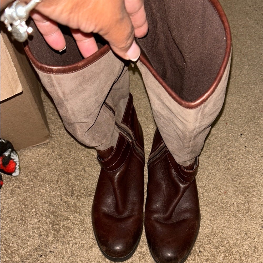 Brown knee-high leather riding boots